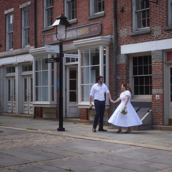 a bride and groom standing in new york